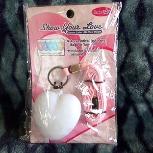 Pink and white glowing keychain